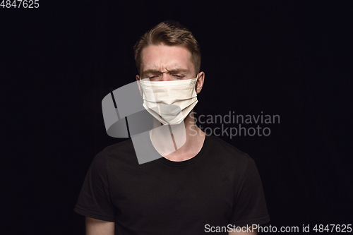 Image of Man in protective mask, coronavirus prevention, protection concept