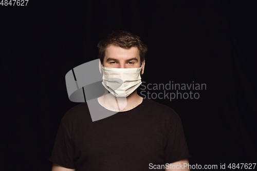 Image of Man in protective mask, coronavirus prevention, protection concept