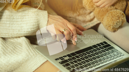 Image of Happy loving family, mother and daughter spending time together at home