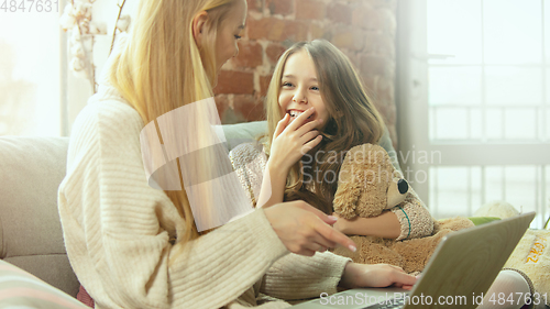 Image of Happy loving family, mother and daughter spending time together at home