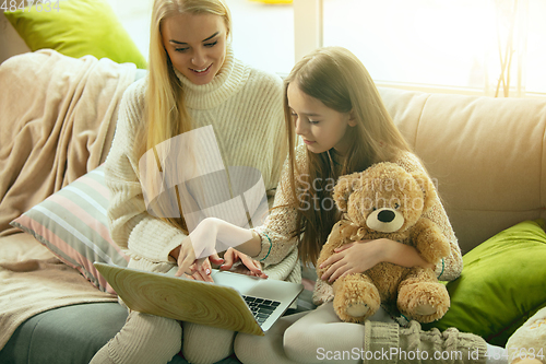 Image of Happy loving family, mother and daughter spending time together at home