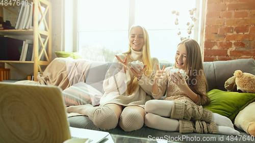 Image of Happy loving family, mother and daughter spending time together at home