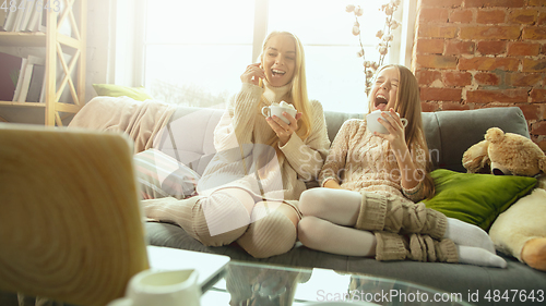 Image of Happy loving family, mother and daughter spending time together at home