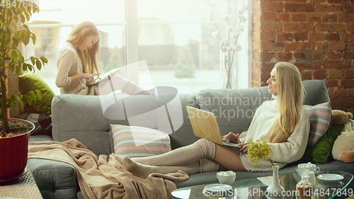 Image of Happy loving family, mother and daughter spending time together at home