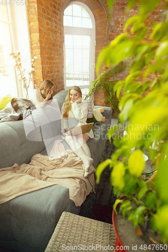 Image of Happy loving family, mother and daughter spending time together at home