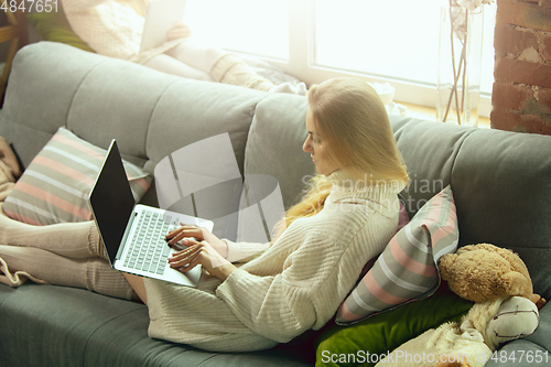 Image of Happy loving family, mother and daughter spending time together at home