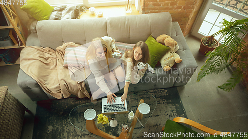 Image of Happy loving family, mother and daughter spending time together at home