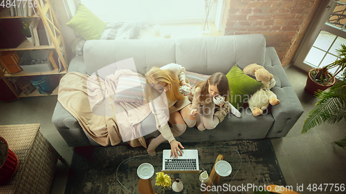 Image of Happy loving family, mother and daughter spending time together at home