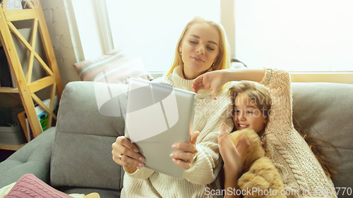 Image of Happy loving family, mother and daughter spending time together at home