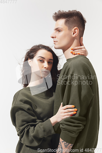 Image of Trendy fashionable couple isolated on white studio background