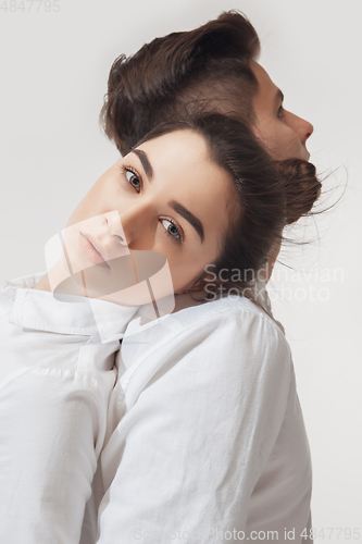 Image of Trendy fashionable couple isolated on white studio background