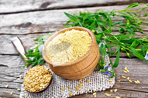 Image of Bran flaxseed in bowl on board