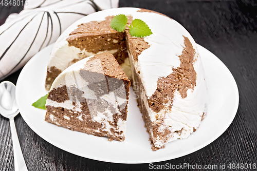 Image of Dessert of curd and chocolate on wooden board