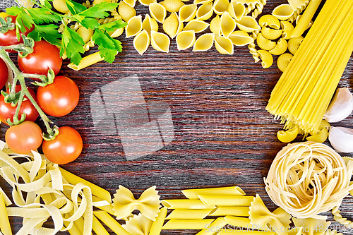 Image of Frame of pasta on brown board