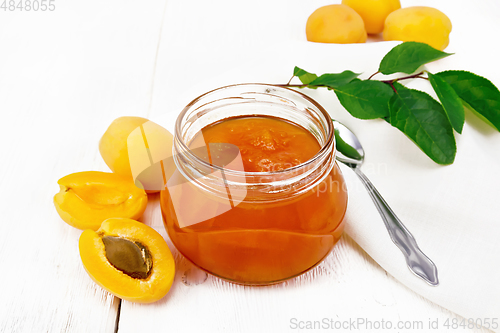 Image of Jam apricot in jar on light board