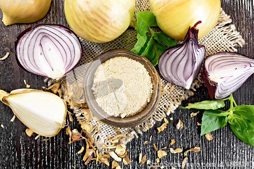 Image of Onion powder in bowl on board top