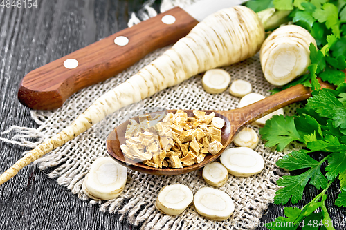 Image of Parsley root dried in spoon on board