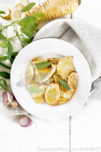 Image of Parsnips baked in plate on light board top