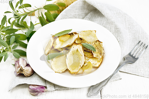 Image of Parsnips baked in plate on light board