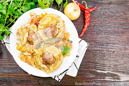 Image of Pasta with meatballs in plate on board top