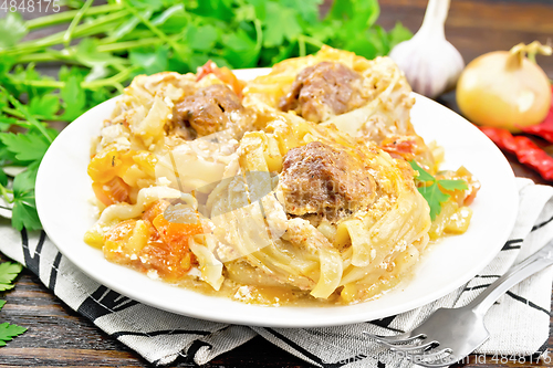 Image of Pasta with meatballs in plate on table