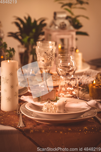 Image of Festive Christmas table in golden tone