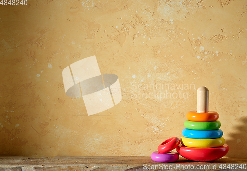 Image of colorful wooden toy pyramid