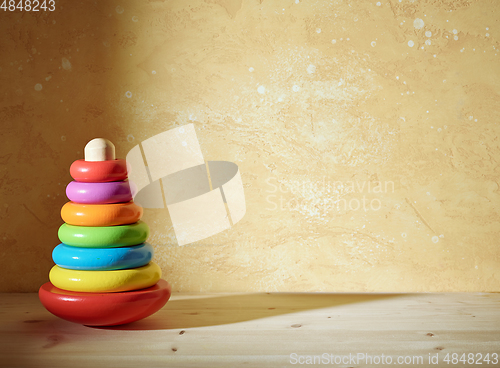 Image of colorful wooden toy pyramid