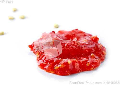 Image of red hot chili pepper sauce