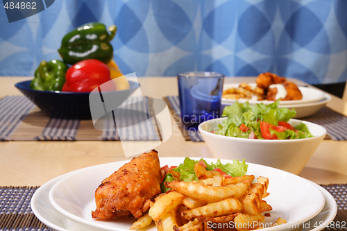 Image of French fries and chicken