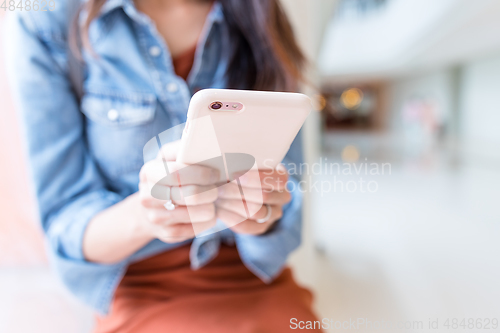 Image of Young Woman use of cellphone