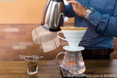 Image of Barista making of hand drip coffee
