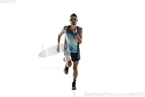 Image of Triathlon male athlete running isolated on white studio background