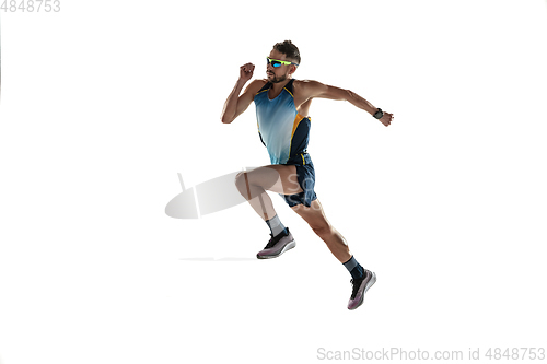 Image of Triathlon male athlete running isolated on white studio background