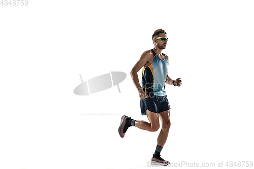 Image of Triathlon male athlete running isolated on white studio background