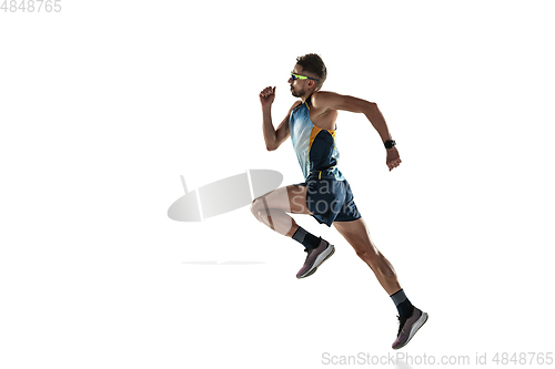 Image of Triathlon male athlete running isolated on white studio background