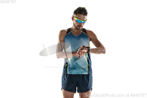 Image of Triathlon male athlete running isolated on white studio background