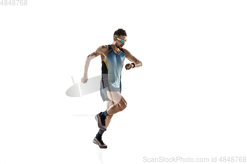 Image of Triathlon male athlete running isolated on white studio background