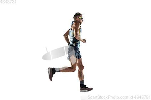 Image of Triathlon male athlete running isolated on white studio background