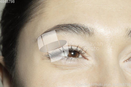 Image of Close up of face of beautiful caucasian young woman, focus on eyes