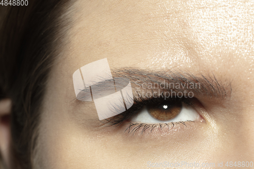 Image of Close up of face of beautiful caucasian young woman, focus on eyes