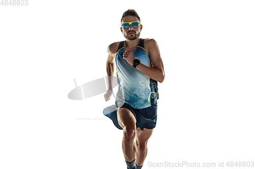 Image of Triathlon male athlete running isolated on white studio background