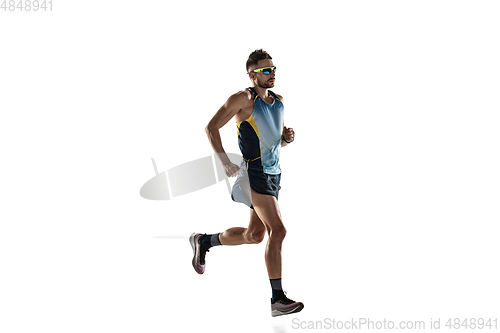 Image of Triathlon male athlete running isolated on white studio background