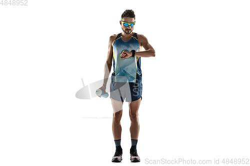 Image of Triathlon male athlete running isolated on white studio background