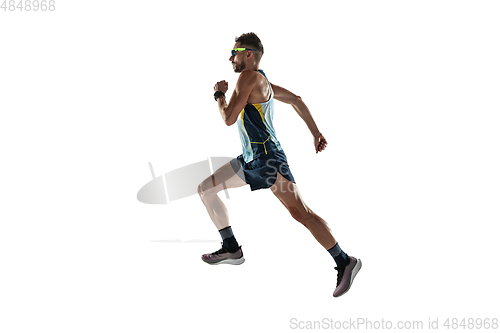 Image of Triathlon male athlete running isolated on white studio background