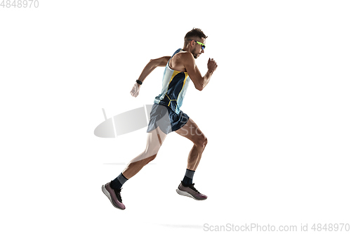 Image of Triathlon male athlete running isolated on white studio background