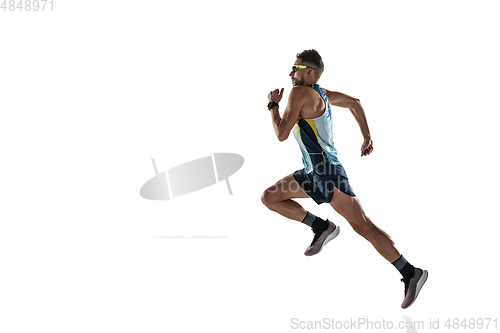 Image of Triathlon male athlete running isolated on white studio background