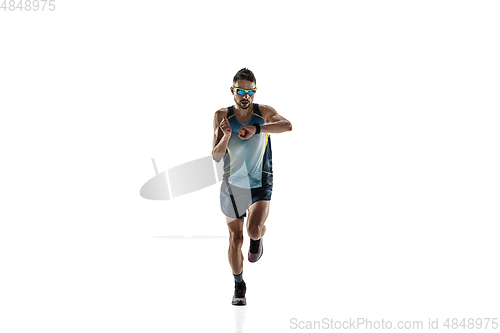 Image of Triathlon male athlete running isolated on white studio background