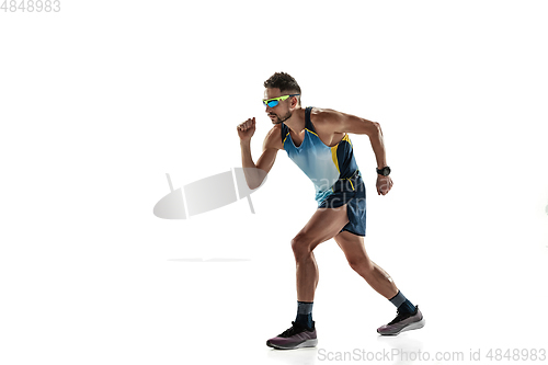 Image of Triathlon male athlete running isolated on white studio background