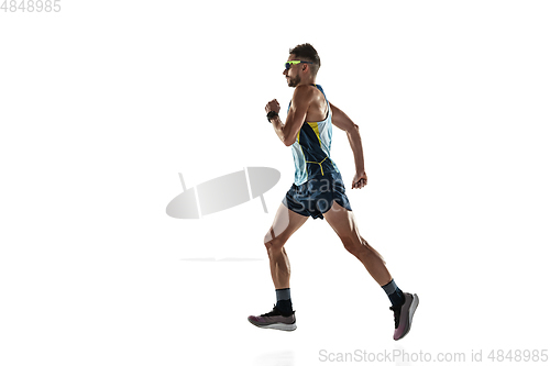 Image of Triathlon male athlete running isolated on white studio background